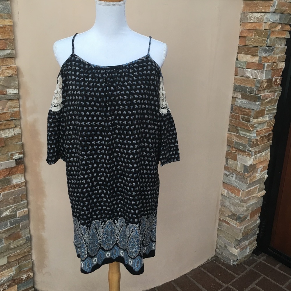 Flirty cold shoulder dress .Size M